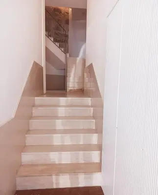 a staircase in a house with white walls at Modern Invicta by Upperground in Porto