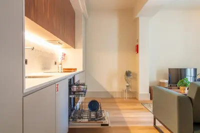 a kitchen with a sink and a dishwasher at Catarina 392 by LovelyStay in Porto