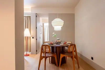 a dining room with a table and chairs at Catarina 392 by LovelyStay in Porto