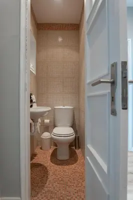 a bathroom with a toilet and a sink at 3BR Flat by Casa da Música, Central, Sleeps 6, E in Porto