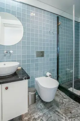 a bathroom with a toilet and a sink and a shower at Ps70 II in Porto