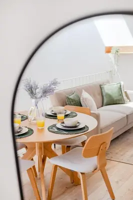 a large library with lots of books on shelves at The Sunny Duplex @ BoaVista Flats in Porto