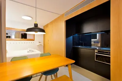 a living room with a couch and a table at Luiz I Optimum Lofts 00 in Porto