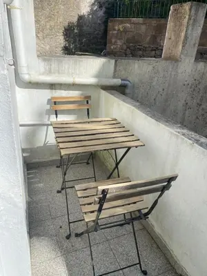 two benches and a picnic table on a patio at Oporto Good Vibrations -Downtown in Porto