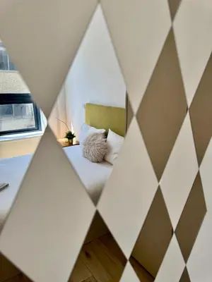 a room with a bed with a pillow on it at Sounds of Porto 424 - Bolhão & Tradition in Porto