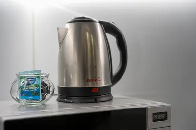 a coffee pot sitting on top of a microwave at GuestReady - Relaxing Porto stay in Porto
