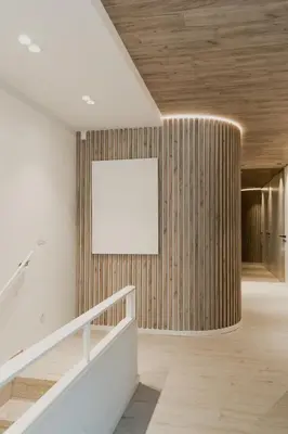 a hallway with white walls and wooden ceilings at ORM - Santa Teresa Apartments in Porto