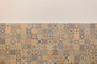 a wall with many different types of tiles at Liiiving in Porto - Invictus Bolhao Market in Porto