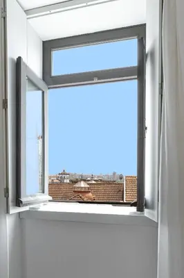 a window with a view of a city at Filigrana Apartments in Porto