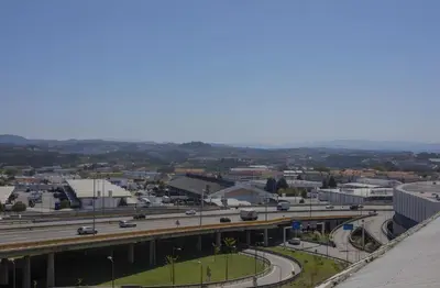 an aerial view of a city with a highway at Oporto Blue Dragão - Modern Uptown Studio With Free Parking in Porto