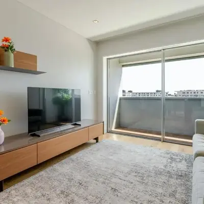 Stylish Home with Balcony & Garage by HostWise
