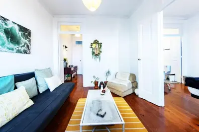 a living room with a couch and a coffee table at Love&Life - Cosy&Central in Porto