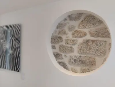 a bowl of water with rocks in it at Timeless Elegance Boutique for two in Porto