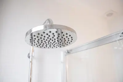 a shower with a shower head in a bathroom at GuestReady - Tempting getaway in Porto in Porto