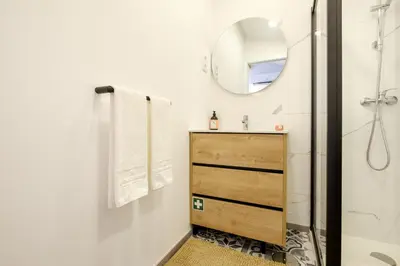 a room with a stairway leading to a bedroom at Cozy Downtown House in Porto