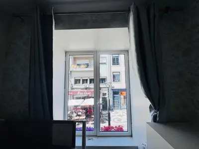 an open window with a view of a street at Majestic Hostel Porto in Porto