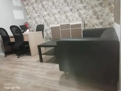 an office with a desk and chairs and a computer at Majestic Hostel Porto in Porto