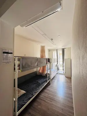a room with a bunk bed in a room at Majestic Hostel Porto in Porto