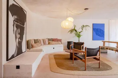 a living room with a couch and a table at Balcony Garden Views at Terracotta Collection in Porto