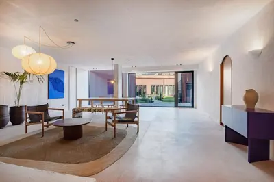 a living room with a table and a dining room at Balcony Garden Views at Terracotta Collection in Porto