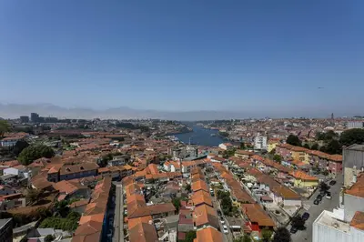 an aerial view of a city with a river at Liiiving in Gaia - Douro Balcony View in Vila Nova de Gaia