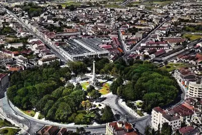 an overhead view of a city with buildings and trees at porto true confession in Porto
