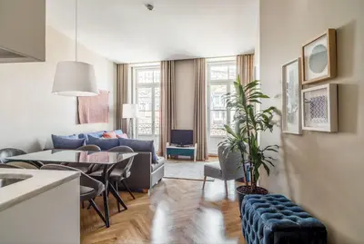 a living room with a couch and a table at Mouzinho 160 in Porto