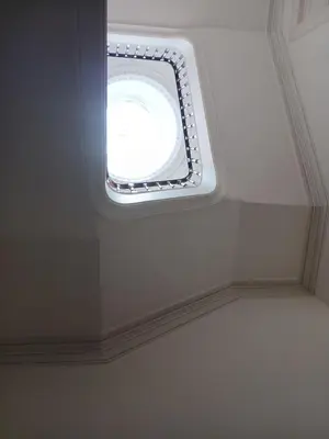 a small window in the ceiling of a room at Top of the World by Upperground in Porto