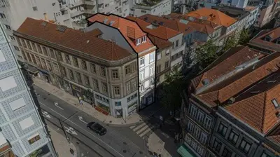 an overhead view of a city street with buildings at Avantgarde by Upperground in Porto