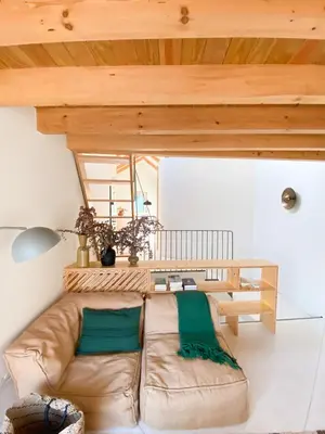a living room with a couch and a wooden ceiling at Plunge Pool River Views Apt A Adults Only in Porto