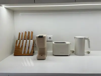 a kitchen with several appliances sitting on a counter at AC, 2Bedrooms APT, City Center 900m to Metro in Porto