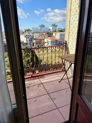 a balcony with a view of a city at Alegria Vintage Apartments - Porto in Porto