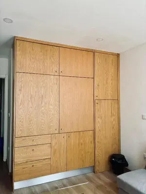 a large closet with wooden doors in a room at Porto Old Town Escape in Porto