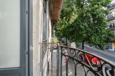 a balcony of a building with a view of a street at GuestReady - Homely experience in Porto in Porto