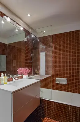 a bathroom with a sink and a shower with a mirror at Porto Pátio by MP in Porto