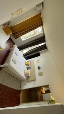 an overhead view of a room with a ceiling at Pink Yellow Porto Apart in Porto