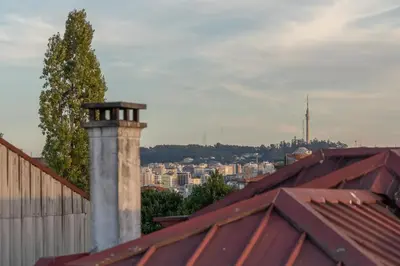 a chimney on the roof of a house at Duplex Studio in Art District by HostWise in Porto