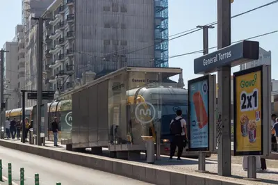a train stopped at a train station with people walking at Morro Flat w Terrace by LovelyStay in Vila Nova de Gaia