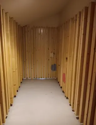 a room with wooden walls and a long hallway at Gray Red Porto Apart in Porto