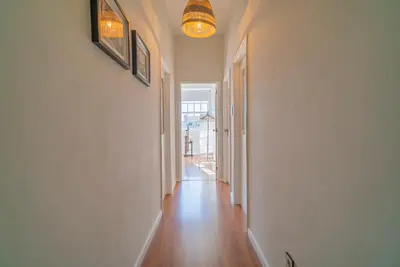 an empty hallway with a hallwayngthngthngthngthngthngthngthngthngthngth at São João by Casa de Gondomil in Porto