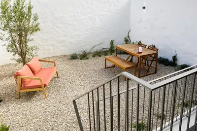an external view of a building with a staircase at Casa Aurelia in Porto