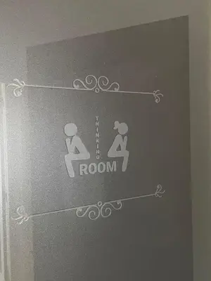 a sign for a room on a wall at Sweet apartment in Porto in Porto