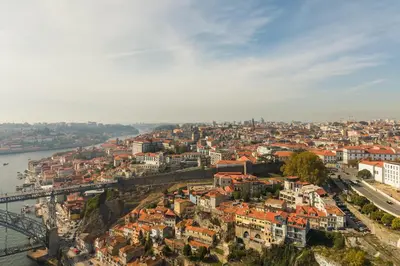 an aerial view of a city with a bridge at City Views Flats in Historic Porto by HostWise in Porto