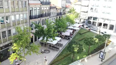 an aerial view of a city street with buildings at Ai Porto! Family 3 in Porto