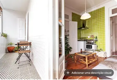 a small kitchen with a green wall at Ai Porto! Family 3 in Porto
