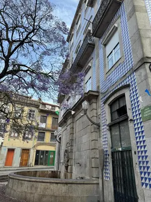 a building with a blue and white tiles on it at Douro Views by MyMoradia in Porto