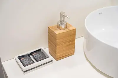 a bathroom with a sink and a toilet and a shower at Noa Porto by Bom Porto Apartments in Porto