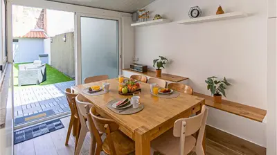 a living room with a couch and two chairs at Urban Terrace Porto in Porto