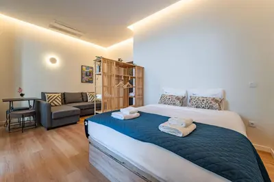 a towel on a bed with the words your worst worst at Castelões Tiles Studio With Terrace in Porto