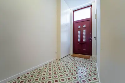a bedroom with a bed with two towels on it at Castelões Tiles Studio With Terrace in Porto